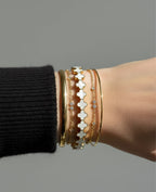 White clover gold plated bangle