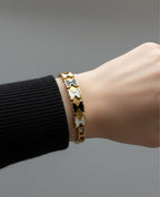 Butterfly gold plated bangel.