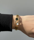 Clover leaf gold plated bangle
