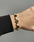 Black and white clover bangle