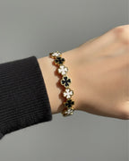 Black and white clover bangle