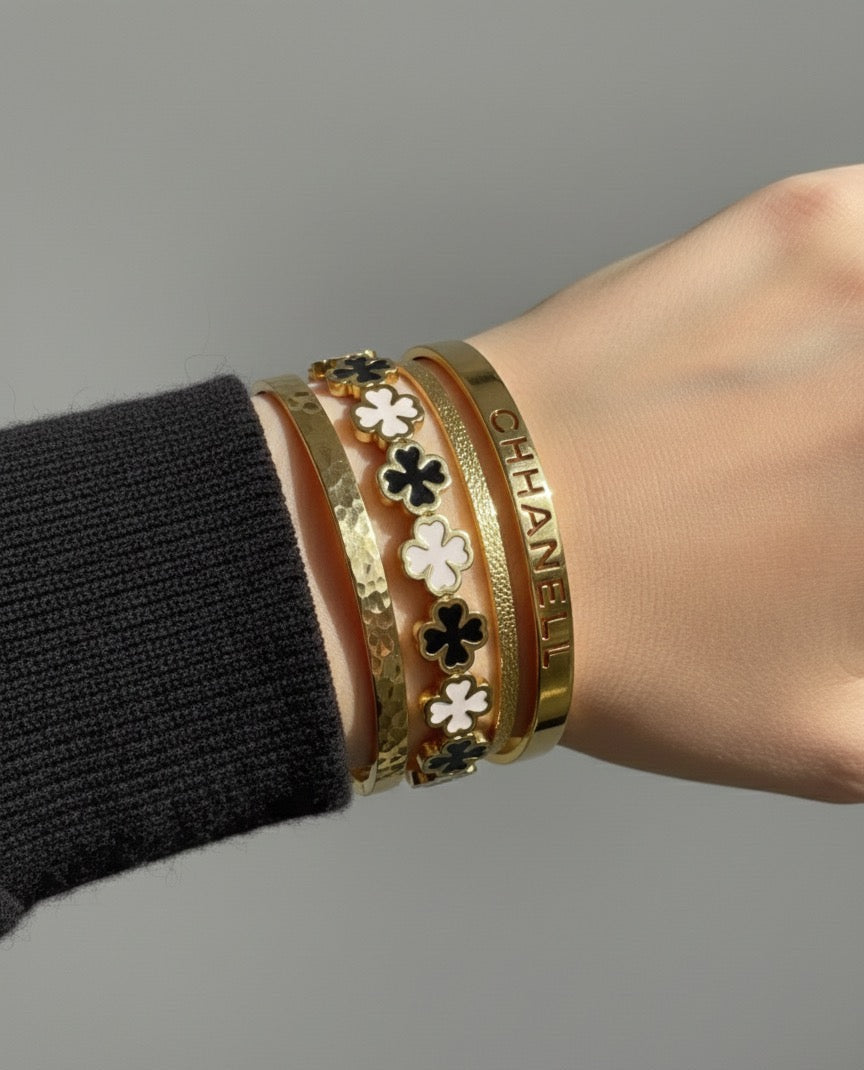 Black and white clover bangle