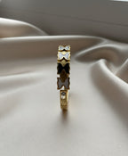 Butterfly gold plated bangel.